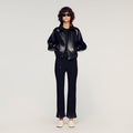 Ruffled knit trousers