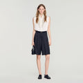 Long high-waisted pleated shorts