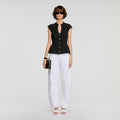Buttoned peplum top